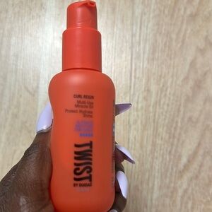 Twist-Curl Reign Multi-Use Miracle Oil - Orange